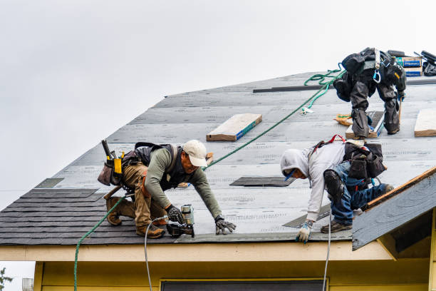 Professional Gutter Installation technician working in Cameron, MO
